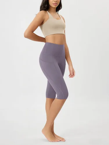 Vista 4 de ODODOS - Leggings tipo capri de mujer, no se traslucen y modelan el abdomen, con cintura alta y bolsillos para hacer yoga, atletismo, ejercicio