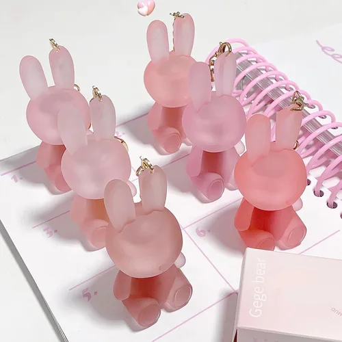 Vista 7 de Juego de lápices labiales líquidos de terciopelo mate de 6 colores, lindo esmalte de labios de conejo 2 en 1, llavero de brillo de labios, tinte