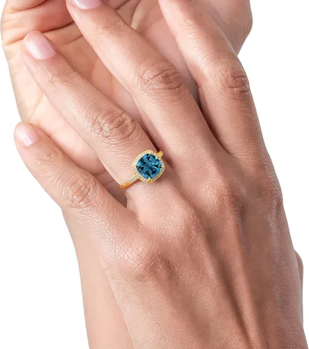 Vista 4 de Gem Stone King Anillo de compromiso de oro amarillo de 10 quilates con topacio azul Londres y diamantes para mujer