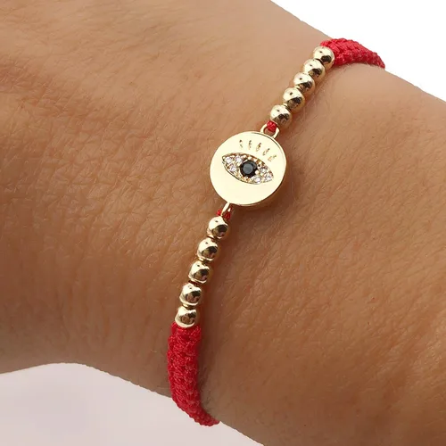 Vista 2 de Pulsera de cuerda ajustable tejida a mano con dije de mal de ojo de la suerte para la protección
