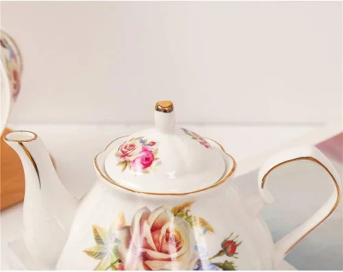 Vista 6 de Juego de té de cerámica europeo de 9 piezas, juego de café de servicio de té de porcelana de hueso con soporte de metal, para boda y regalo, pintura