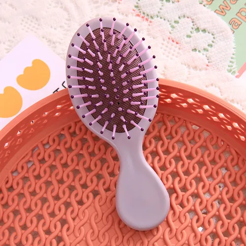 Vista 8 de Mini cepillo de pelo mojado de 20 piezas, cepillo desenredante de viaje con cerdas suaves para la mayoría de tipos de cabello, práctico de operar