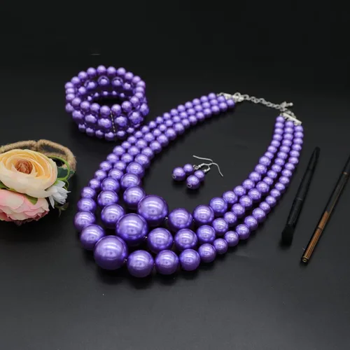 Vista 4 de We - Collar de perlas de imitación para mujer, collares de perlas grandes y gruesas, collar de perlas multicapa y aretes de los años 20