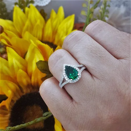 Vista 57 de Dazzlingrock Collection Anillo de compromiso con forma de lágrima y diamante blanco natural redondo de 0.45 quilates con halo de diamantes blancos