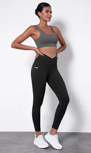 Vista 4 de ODODOS Leggings de yoga con cintura cruzada para mujer con bolsillos, pantalones de yoga de entrenamiento cruzado de 2528 pulgadas