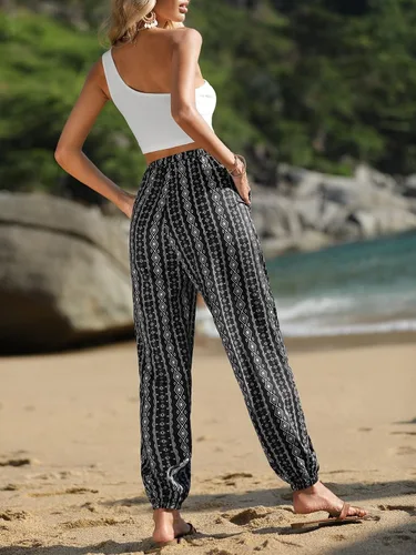 Vista 3 de SOLY HUX Pantalones acampanados con estampado floral de rayas tribales para mujer, cintura alta elástica, pierna acampanada, pantalones acampanados