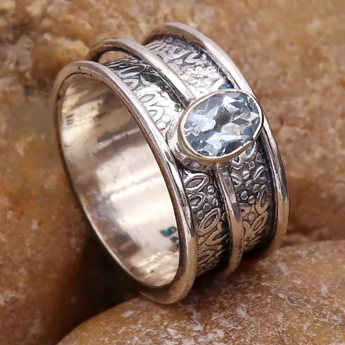 Vista 4 de Goyal Exports SRG328A - Anillo giratorio de plata de ley 925 con topacio azul