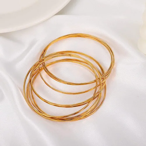 Vista 4 de Choistily Pulseras apilables de oro para mujer, juego de pulseras multiindias para adolescentes y niñas, pulseras lisas de cable en capas, pulseras