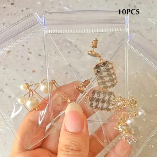 Vista 3 de PHILISENMALL Bolsa de almacenamiento de joyería de PVC transparente, portátil, antideslustre, con cierre de cremallera, bolsa de joyería gruesa