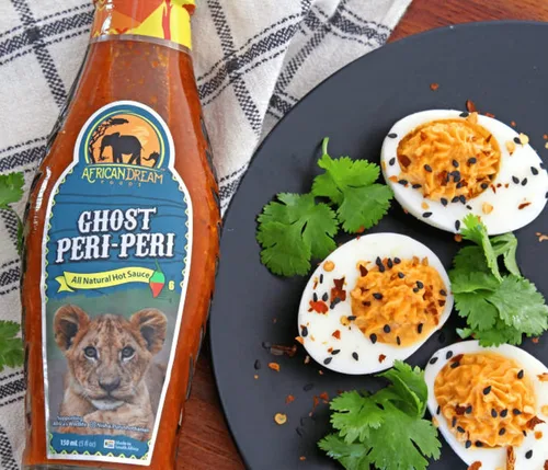 Vista 9 de Ghost Peri-Peri Salsa picante de African Dream Foods Salsa piri-piri picante totalmente natural con pimientos fantasma africanos Vegana, sin