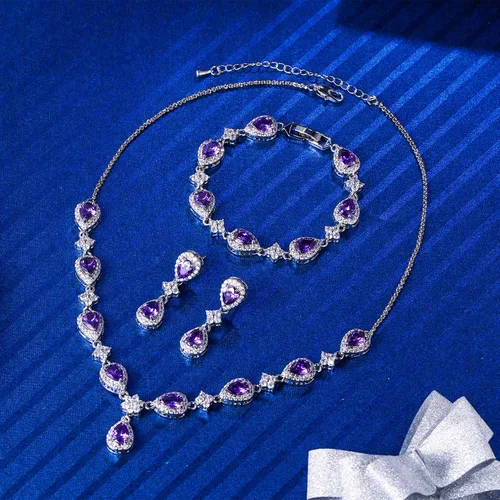 Vista 3 de EleQueen, juego nupcial de collar en V, pulsera tenis y aretes colgantes, con circonia cúbica, flor y lágrima, tono plateado, para mujer