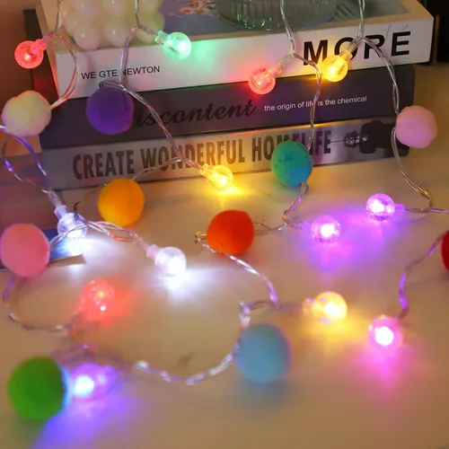 Vista 9 de ChiRee Guirnalda de luces para interiores de 6.56 pies, luces de hadas con pompones, 20 LED, funciona con pilas, luces de bola de cadena, luces
