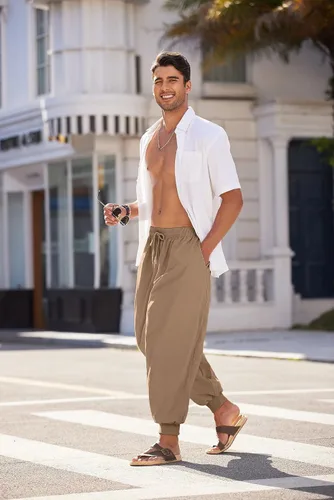 Vista 4 de COOFANDY Pantalones de harén hippie para hombre, holgados, de lino, algodón, pantalones de yoga, pantalones de playa de verano, pantalones casuales