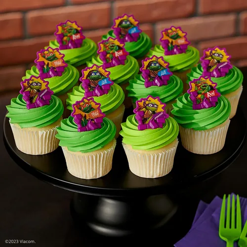 Vista 2 de DecoPac Anillos de poder de tortugas ninja mutantes adolescentes, decoraciones de cupcakes para fiestas de cumpleaños, pasteles y celebraciones