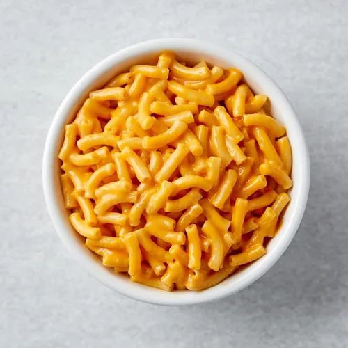 Vista 3 de Annie's Homegrown Caracolitos con queso cheddar suave, macarrones y queso natural caja de 6 onzas