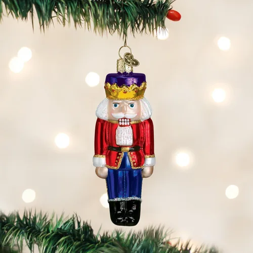 Vista 2 de Old World Christmas Adorno de cristal soplado del Príncipe Cascanueces para árbol de Navidad, decoración navideña hecha a mano, colección navideña