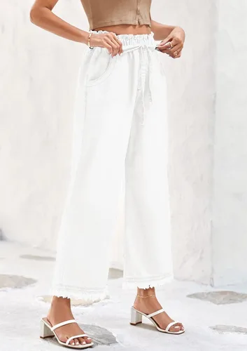 Vista 2 de Valphsio Pantalones de mezclilla holgados de pierna ancha para mujer, cintura con lazo en la cintura, culottes de cambray, pantalones con borlas