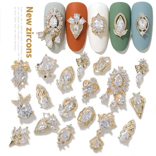 Vista 8 de Dijes y gemas para uñas, circonita de cobre dorado, múltiples formas 3D, diamantes de imitación de metal de lujo para uñas, 14 piezas 13 dijes