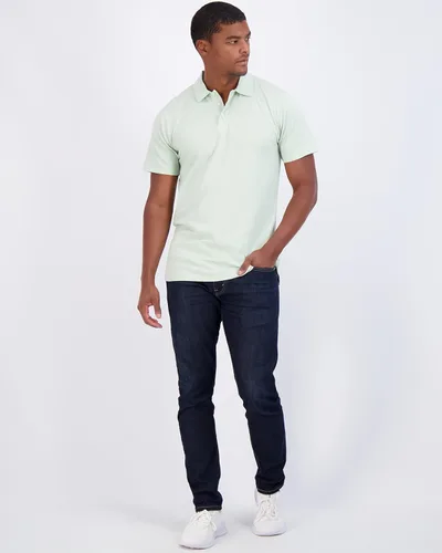 Vista 56 de Real Essentials Paquete de 3: Polo de manga corta de algodón para hombre, de secado rápido, transpirable, (disponible en tallas grandes y altas)
