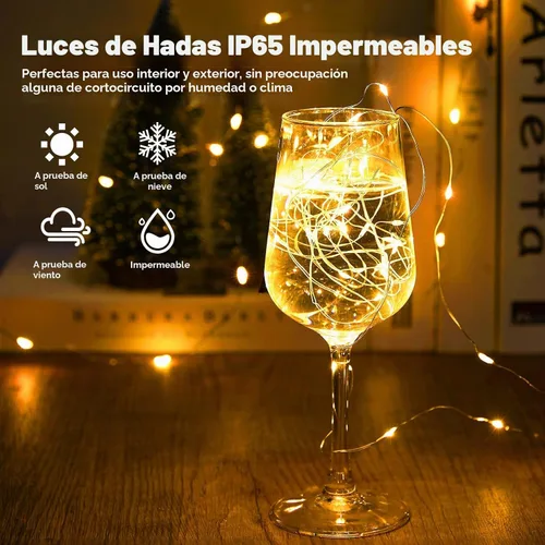 Vista 6 de Minetom - Paquete de 12 luces LED con pilas para decoración navideña Blanco cálido