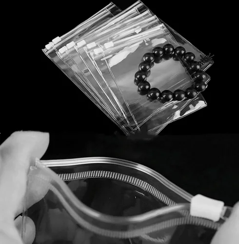 Vista 2 de 50 bolsas largas para joyas, bolsa transparente con cremallera para collares, bolsas de PVC de 0.9 x 7.9 in, pequeñas bolsas selladas antioxidación