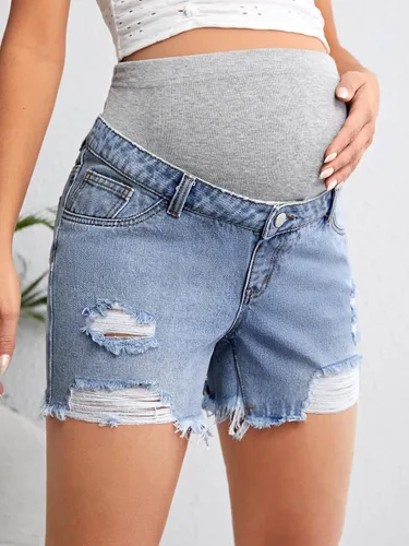 Vista 3 de Verdusa Pantalones cortos de mezclilla de maternidad para mujer, cintura alta, rasgados, dobladillo sin procesar, pantalones cortos de embarazo