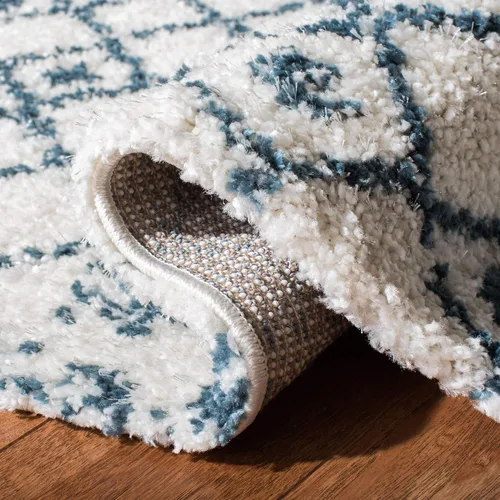 Vista 4 de SAFAVIEH Berber Fringe Shag Collection - Alfombra decorativa de 2 pies 2 pulgadas x 4 pies, color crema y azul, diseño, no desprende pelusa
