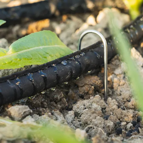 Vista 7 de Manguera de remojo plana de 15 pies, ahorra un 70% de agua, diseño a prueba de fugas, manguera de rociador de goteo de doble capa para cama de jardín