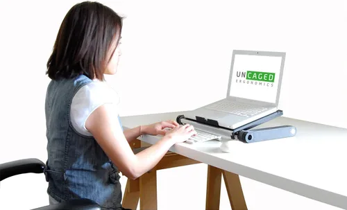 Vista 7 de Uncaged Ergonomics WorkEZ luz - Cooler para laptop de aluminio, ergonómico, portable, superligero, soporte para tablets y libros, Negro