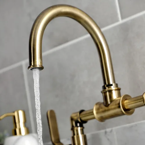Vista 2 de Kingston Brass KS2173KL Whitaker - Grifo de baño de estilo industrial con drenaje emergente, latón antiguo