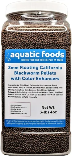 Vista 3 de Pellets flotantes de gusano negro de 0.079 in con potenciadores de color y vitaminas. Ideal para todos los peces tropicales, peces marinos