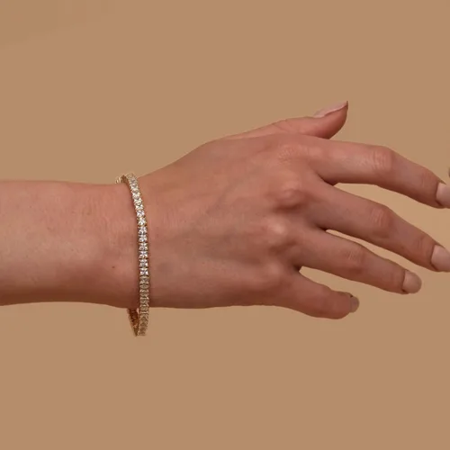 Vista 2 de PAVOI Pulsera de tenis clásica chapada en oro de 14K con circonita cúbica Pulseras de oro para mujer CZ de 0.16 in, tamaño 6.5-7.5 pulgadas