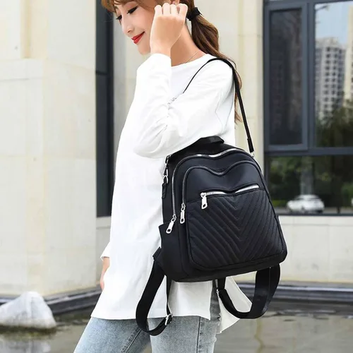 Vista 4 de Mochila para mujer de gran capacidad bordada a prueba de agua de tela a la moda simple mochila de viaje