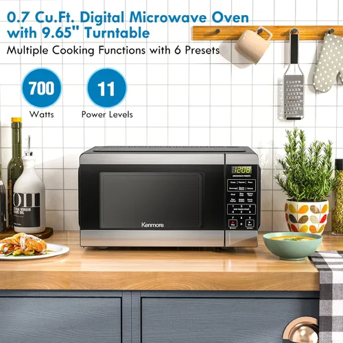 Vista 2 de Microondas de mostrador Kenmore, 6 menús preestablecidos automáticos, bloqueo para niños, funciones de descongelación y cocina exprés, 700 vatios, 7