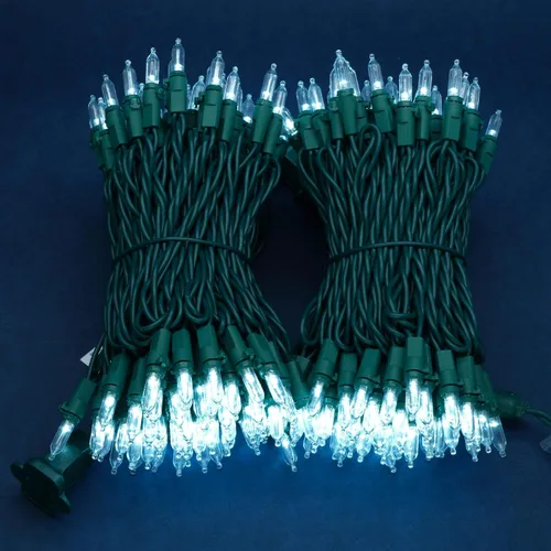 Vista 3 de Luces de Navidad LED de color blanco frío de 200 unidades, paquete de 2 juegos de 7.6 metros, juego de 25 pies de 100 luces LED con cable verde
