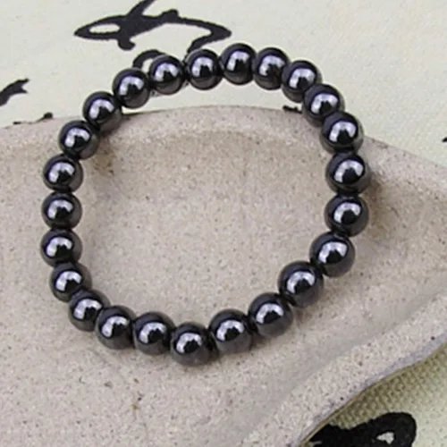 Vista 4 de Pulseras de cuentas para mujer Pulsera de piedra magnética redonda negra de moda unisex para el cuidado de la salud