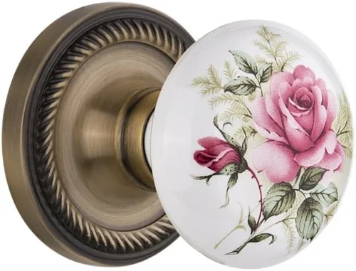 Vista 14 de Nostalgic Warehouse 711306, Mortaja de 2.25 pulgadas, roseta de cuerda de latón antiguo con perilla de porcelana rosa blanca