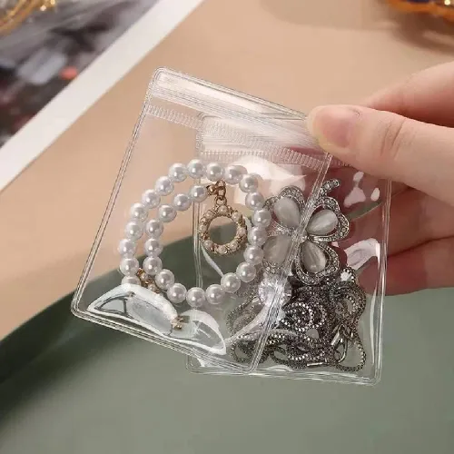 Vista 3 de WEDDINGHELPER Bolsas de joyería, pequeñas bolsas de plástico autosellantes con cierre transparente de PVC para guardar pulseras, anillos, aretes
