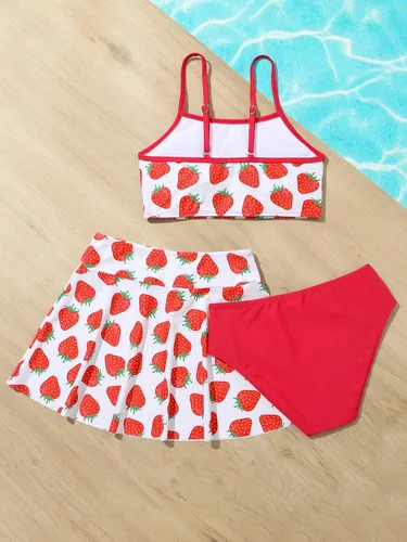 Vista 2 de WDIRARA Bikini de 3 piezas con estampado de fresas para niña, trajes de baño lindos con falda de playa