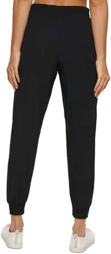 Vista 3 de Calvin Klein Performance Pantalones deportivos con bloqueo de brillo para mujer (negro, S), Negro
