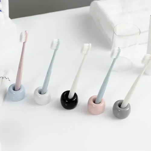 Vista 7 de Mini soporte de cerámica para cepillos de dientes para parejas, soporte para cepillos de dientes de baño hecho a mano, soporte para cabezal