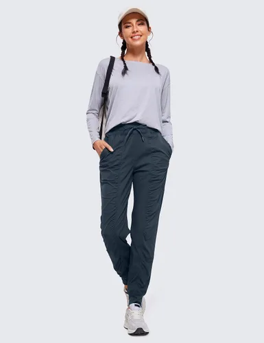 Vista 3 de CRZ YOGA Pantalones deportivos ligeros de entrenamiento para mujer, pantalones casuales de cintura alta para correr al aire libre con bolsillos