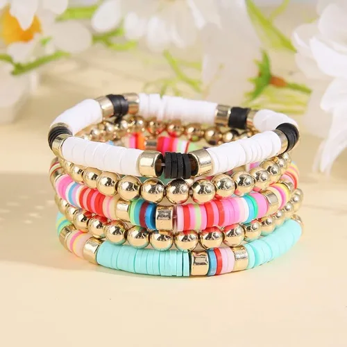 Vista 2 de Wonlte - Juego de pulseras de cuentas de arcilla Heishi, pulseras elásticas apilables con cuentas de mal de ojo, pulseras elásticas apilables