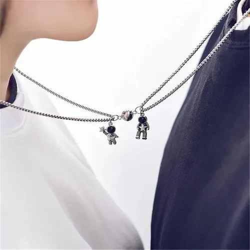 Vista 2 de Caiyao 2 imanes de atracción mutua de acero inoxidable para parejas, collar magnético de promesa de astronauta para mujeres, hombres, amigos, él