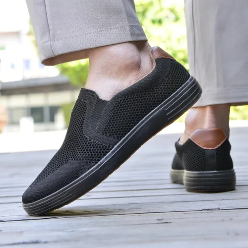 Vista 8 de Puxowe Men's Slip On Loafers, Comfy & Knit Walking Shoes with Arch Support Todo negro