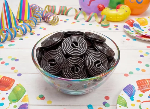 Vista 5 de Ruedas de regaliz negro caramelo 1 lb a granel suave masticable clásico