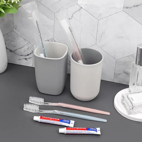 Vista 9 de Paquete de 50 cepillos de dientes desechables con pasta de dientes con 150 púas de hilo dental envueltas individualmente