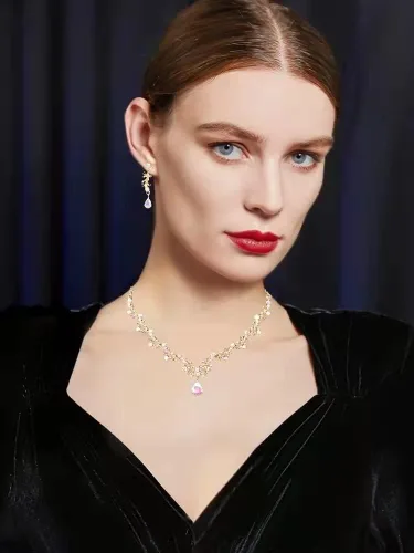Vista 3 de Juego de 3 piezas de joyería de cristal austriaco para mujer, collar y aretes colgantes, pulsera de eslabones con chapado en oroplatinoarma, joyería