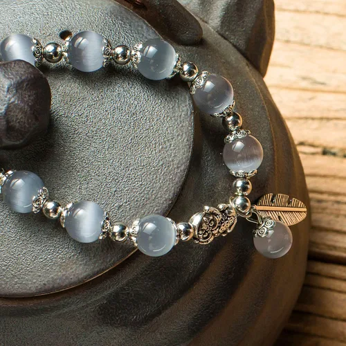 Vista 3 de MANRUO Feng Shui La mejor pulsera de cuentas de ojo de tigre natural de 0.394 in con colgante de plata chapado en plata Pi XiuPi Yao amuleto