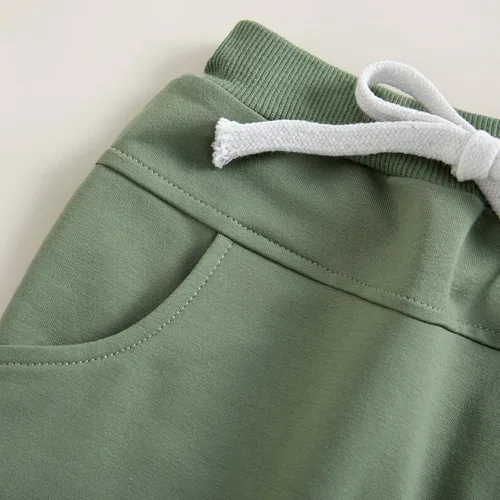 Vista 7 de Mubineo Pantalones deportivos básicos lisos para bebés, niños y niñas, cómodos pantalones de algodón con bolsillos